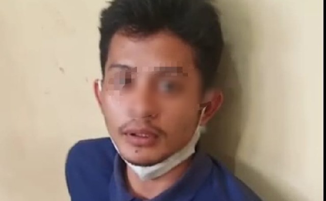 Muhammad Ilham Rizky, pelaku pembakaran kursi dan bantal milik ayahnya saat di Mapolsek Medan Sunggal. (Jhonson Siahaan)